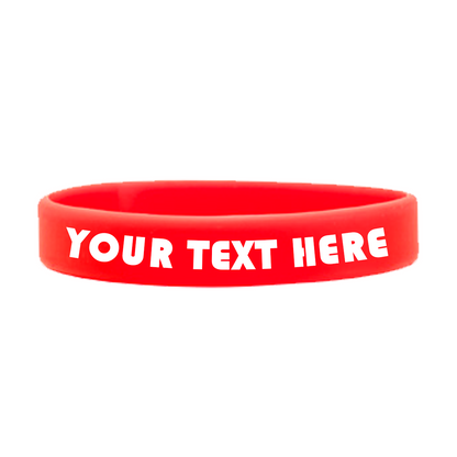 A high-quality Customizable Adult 1/2" Silicone Wristbands in red with "YOUR TEXT HERE" printed in white, perfect for promoting a cause. Sold by Specialist ID.