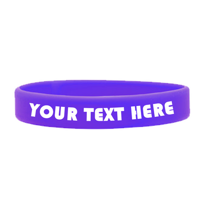 Purple, high-quality silicone wristband with the phrase "YOUR TEXT HERE" written in white, all capital letters. Perfect for promoting a cause or creating Customizable Adult 1/2" Silicone Wristbands. Sold by Specialist ID.