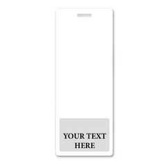 A white name badge with a rectangular shape and a small slot at the top for a lanyard. The bottom section features a gray area with the placeholder text "YOUR TEXT HERE." Perfect for Oversized Custom Vertical Badge Buddy XL- (Extra Large Size) to suit any professional setting.
