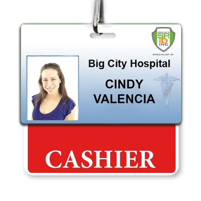 A hospital ID badge with a photo of a woman, labeled "Big City Hospital," "Cindy Valencia," and "Cashier," crafted from the highest quality synthetic paper for durability. This CASHIER Horizontal Badge Buddy with Red Border ensures clear role recognition in any busy environment.