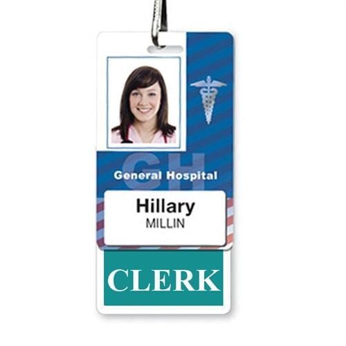A hospital ID badge with a teal border showcases the photo of a woman, labeled "General Hospital." The name on the badge is Hillary Millin, and her job title is Clerk. In this hospital setting, her role is highlighted by the distinctive CLERK Vertical Badge Buddy with TEAL Border.