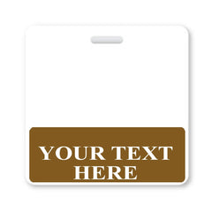 A Custom Printed Badge Buddy Horizontal (Standard Size) with a brown section at the bottom containing the text "YOUR TEXT HERE." The badge, which is compatible with standard size ID badges, has a slot at the top for attachment. Ideal for creating custom badge buddies to enhance instant roll recognition.
