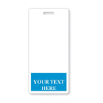 A Custom Printed Badge Buddy Vertical (Standard Size) with a rectangular cutout at the top for attaching a lanyard. The bottom of these custom badge buddies features a blue box with the text "YOUR TEXT HERE." Perfect for identification badges in various settings.