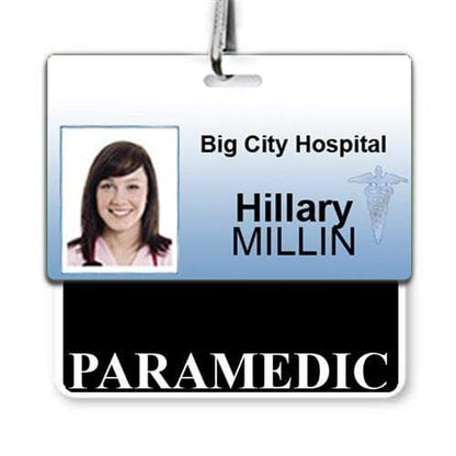 ID badge for Big City Hospital showing the name "Hillary Millin," a photo of a woman, and the title "Paramedic" for instant role recognition using a PARAMEDIC Horizontal Badge Buddy with BLACK Border.