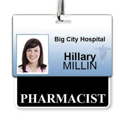 A laminated teslin hospital ID badge featuring the text "Big City Hospital," a photo of a person, the name "Hillary MILLIN," and the title "PHARMACIST." This "Pharmacist" Horizontal Badge Buddy with Black Border ensures quick recognition in any medical setting.