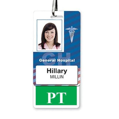 A standard-sized ID badge displays a photo of Hillary Millin, labeled "General Hospital" with "PT" at the bottom for role recognition in physical therapy. Adding a Physical Therapist "PT" Vertical Badge Buddy with GREEN Border provides clear, immediate identification.