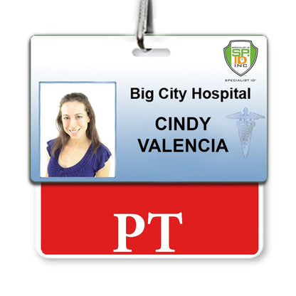 A hospital staff ID badge for Big City Hospital features the name "Cindy Valencia" and has a Physical Therapist "PT" Horizontal Badge Buddy with RED Border for clear role recognition in the bustling hospital environment.