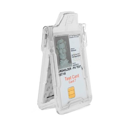 A clear, plastic Identity Stronghold RFID Blocking Secure Badgeholder Classic - Holds 1 Card - Shields 13.56MHz Signal (IDSH1004-001B-002) displaying a test ID card with a prominent chip labeled "Test Card Card 7". The ID card includes placeholders for a photo, name, role, and department.