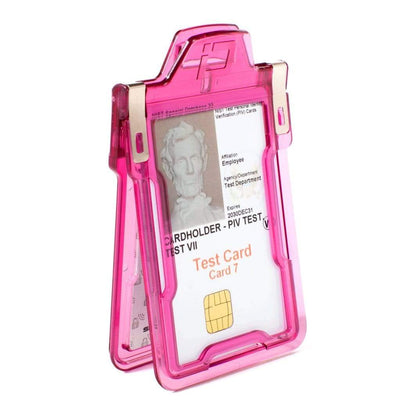 A pink, transparent Identity Stronghold RFID Blocking Secure Badgeholder Classic - Holds 1 Card - Shields 13.56MHz Signal (IDSH1004-001B-002) containing a test card labeled "Test Card Card 7" with an image of Abraham Lincoln. The holder features RFID Blocking technology for added security.