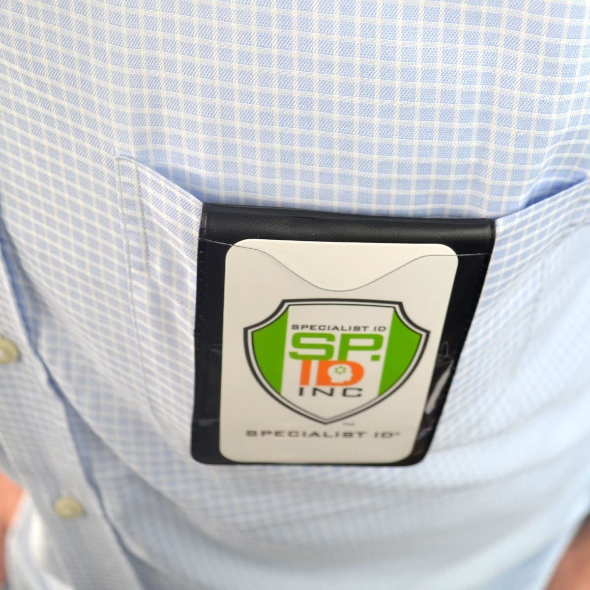 A person in a blue checkered shirt has a Magnetic Vertical Double Pocket Badge Holder (1835-1115) with a badge labeled "Specialist ID SP INC" in the shirt pocket.