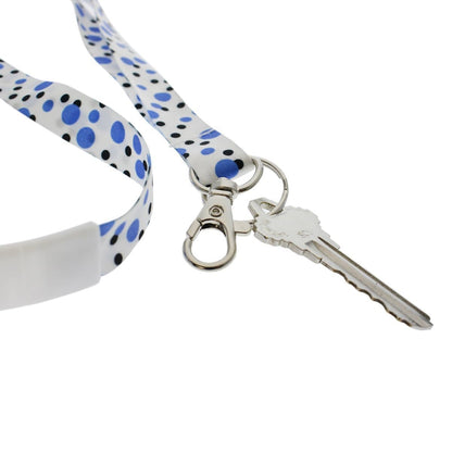 A single key is attached to a Cute Polka Dot Pattern Fashion Lanyard With Lobster Hook And Key Ring(P/N 2138-728X), featuring a key ring and trigger snap hook for added convenience.