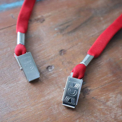 Red double clip lanyard with two metal bulldog clips