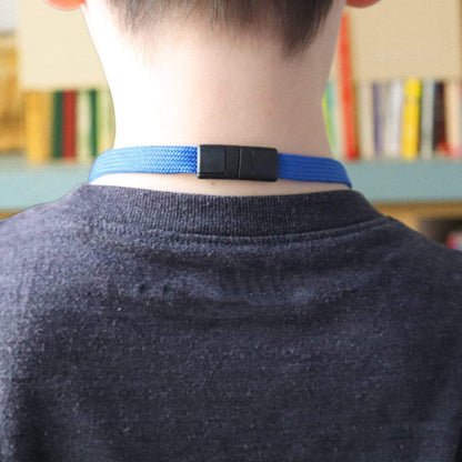 Close-up of the back of a person's neck wearing Kids Safe Double Ended Lanyards with Safety Breakaway Clasp and Two Hook Endings - Short Length for Children, with a bookshelf in the background.