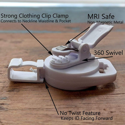 A white clothing clip clamp described as strong, the MRI Safe Badge Reel - Non-Ferrous Metal Retractable Badge Clips with No Twist ID Holder Clip for Imaging Room Techs & Nurses, with a 360 swivel, no twist feature to keep ID facing forward, and able to connect to neckline, waistband, and pocket.