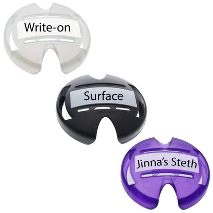 Three Custom Stethoscope ID Tags - Upload Your Logo to Customize labeled: "Write-on" (white), "Surface" (black), and "Jinna's Steth" (purple), showcasing different colors and labels, perfect for medical staff identification.
