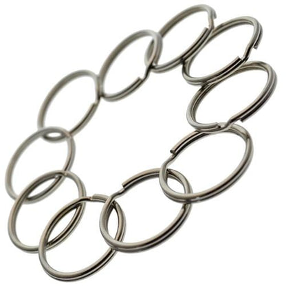 A circular arrangement of ten 100 Round Split Ring Key Chains - 1" Inch Size - Heavy Duty Premium Key Rings in Bulk (SPID-9230) crafted from heat-treated steel on a white background.