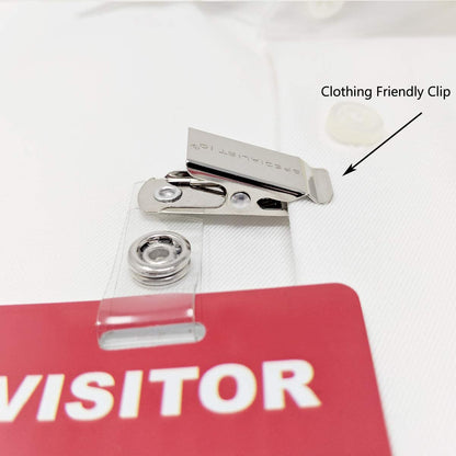A close-up of a Reusable Visitor Passes with Clothing Friendly Badge Clip with "Clothing Friendly Clip" text pointing to a metal clip attached to a white fabric.