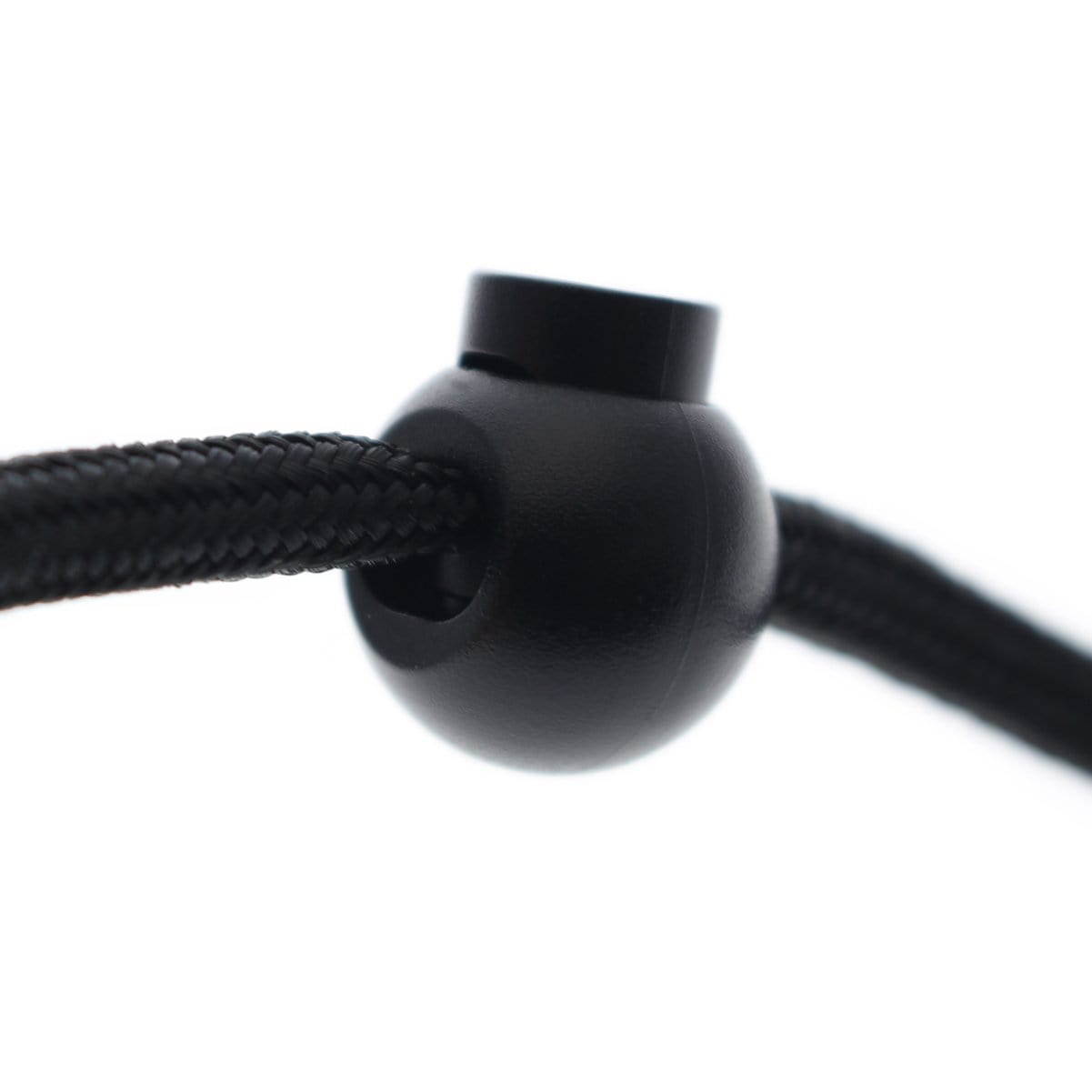 Close-up of a black Adjustable Cord Lock - Round Ball Style - Single Hole End Toggle for DIY Projects (2135-4001) securing two intertwined black cords against a white background.
