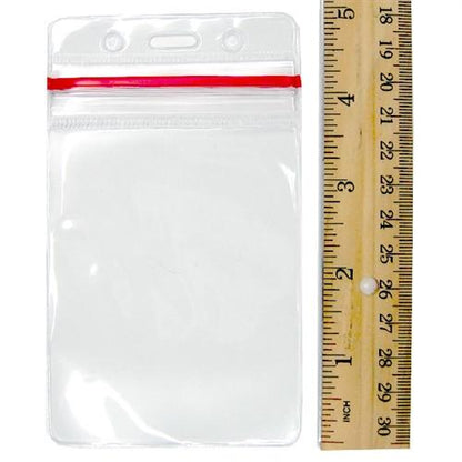 A Clear Vertical Vinyl ID Holder with a Zipper Top (VBH-V-ZIP), placed next to a wooden ruler.