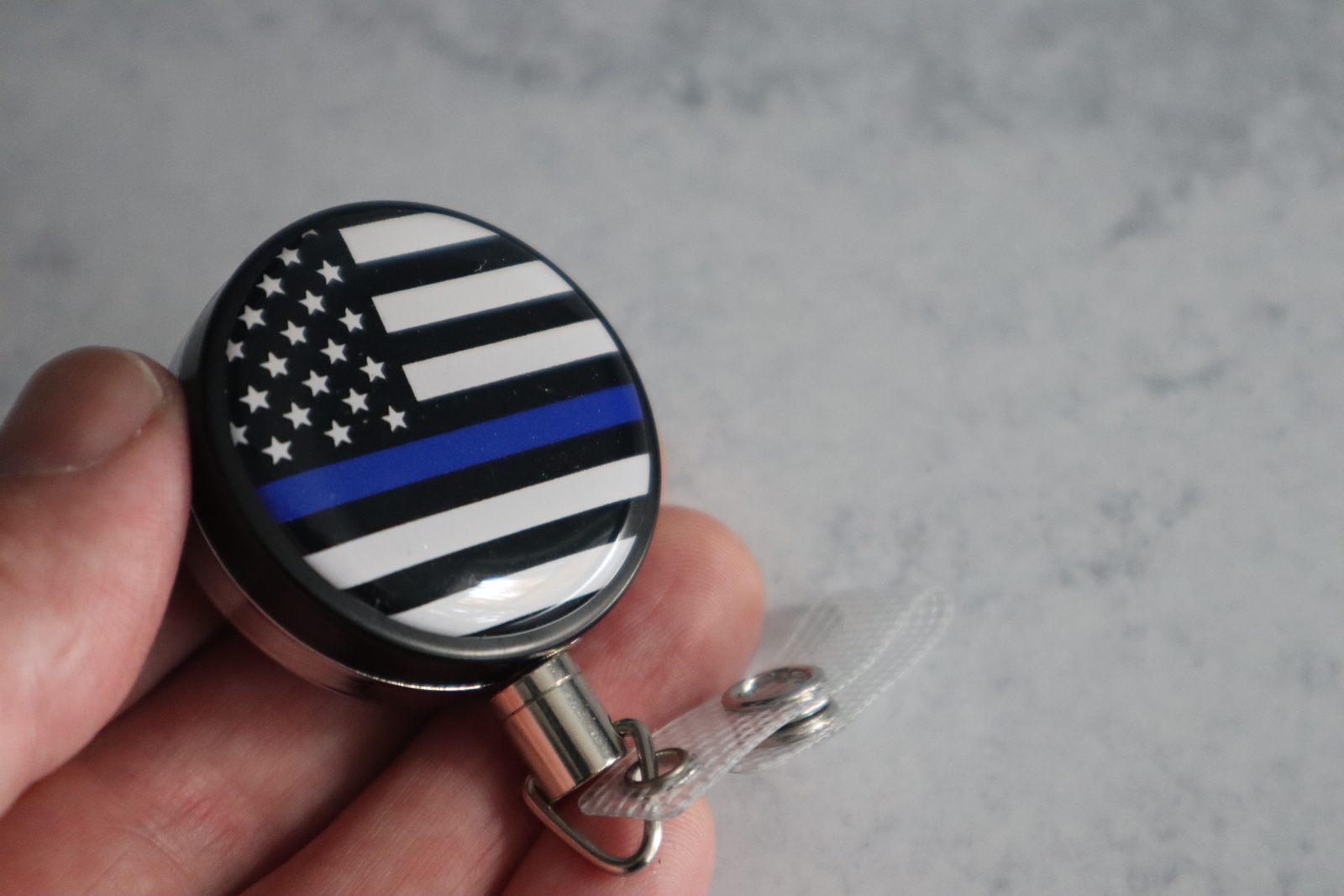 Thin blue line flag, black reel